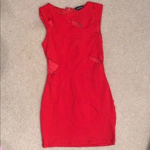 Bright red Bebe cut out bodycon dress.